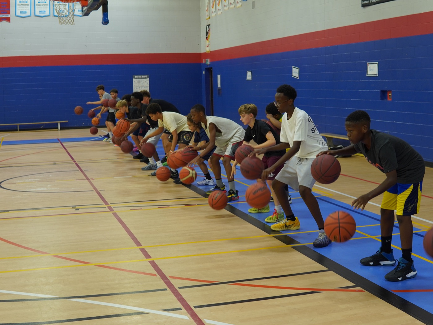Young athletes practicing ball-handling fundamentals