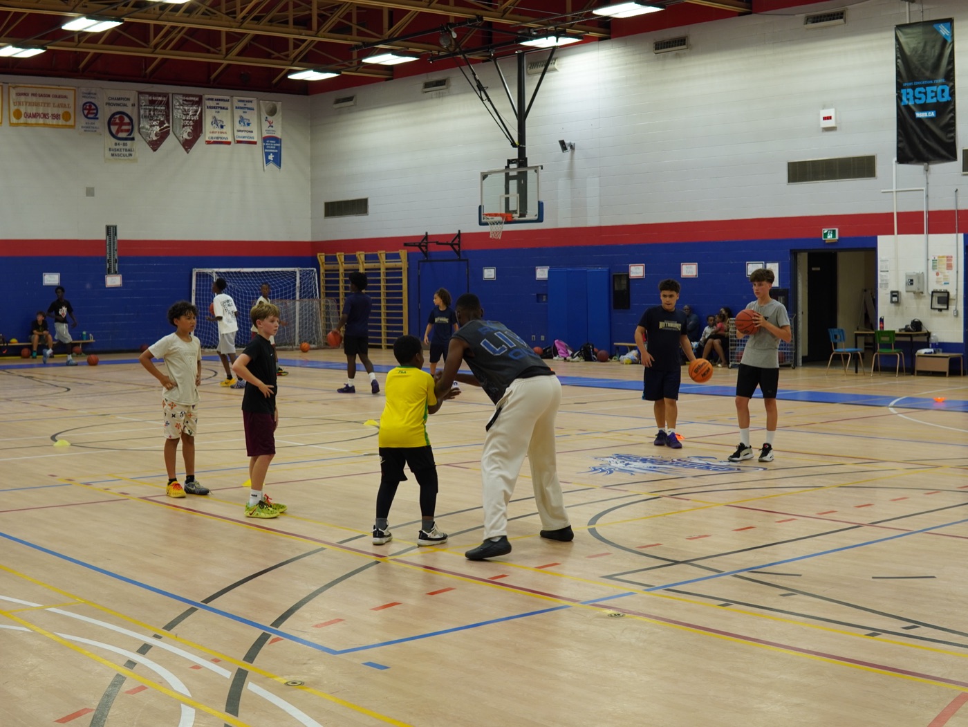 Coach Michael running a small-group defensive drill